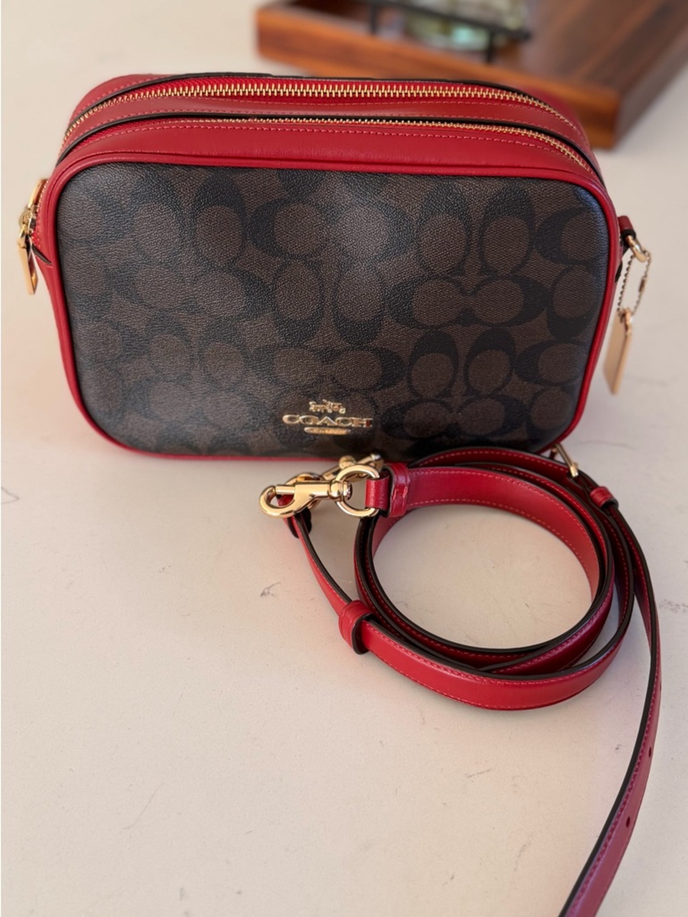 Coach Brown Signature Canvas Crossbody with Red Trim